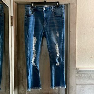 Haute Curve - distressed blue cropped with raw hem jeans - size 18